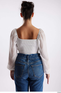 Suleika  1 arm back view casual dressed flexing 0001.jpg